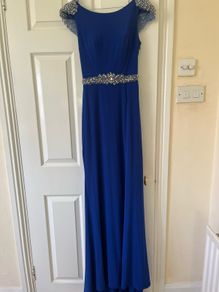 Debs dress for sale. Royal blue debs dress. Size 6 but would fit UK size 8. Freshly dry cleaned. Some loose thread on the back but otherwise in good condition.