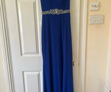 Debs dress for sale. Royal blue debs dress. Size 6 but would fit UK size 8. Freshly dry cleaned. Some loose thread on the back but otherwise in good condition.