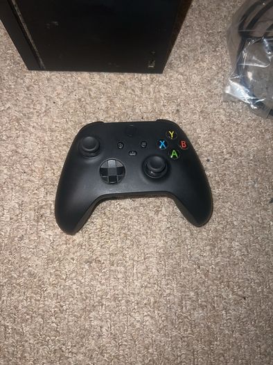 Xbox series x, 2 controllers and rechargeable battery pack& charger stand