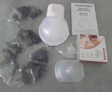 Momcozy breast pump, flanges, silver cups & Lansinoh therapy pads