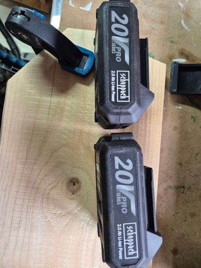 brand new cordless drill with 2 batteries, a charger, and carry case.