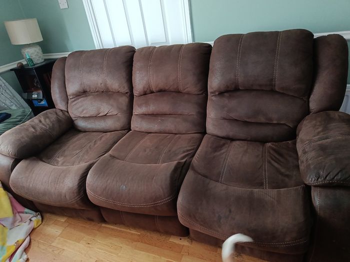 Brown fabric reclining sofa and armchair