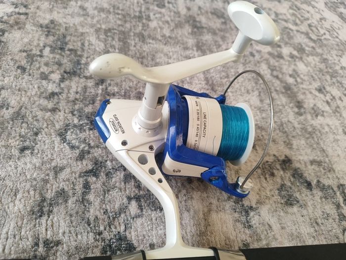Mitchell Neuron Mackerel 300 fishing rod  with ocean lure