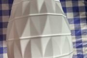 Small white plastic vase - 10L x 6W x 2H centimetres