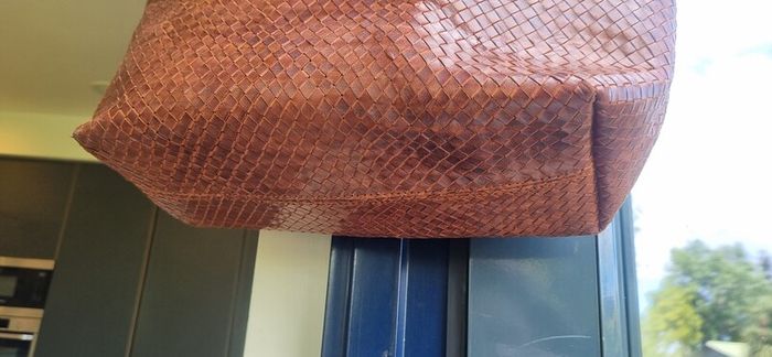 brown leather woven shoulder bag