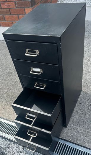 Vintage metal cabinet with drawers