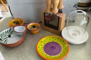 Cheese knife set with magnetic base 15.00 euro, Pottery/Terra Cotta Bowl w/side Section, Olive Pattern, Portugal and 2 small bowl  18.00 euro.,.Ceramic Garlic Lemon Grater Plate Hand Painted 12.00 euro.,Glass display small dome with white carmic tea light