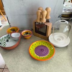 Cheese knife set with magnetic base 15.00 euro, Pottery/Terra Cotta Bowl w/side Section, Olive Pattern, Portugal and 2 small bowl  18.00 euro.,.Ceramic Garlic Lemon Grater Plate Hand Painted 12.00 euro.,Glass display small dome with white carmic tea light