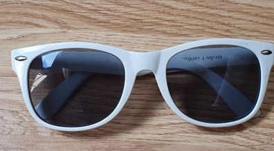 A Pair of White Sun Glasses
