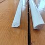 Two 2.4m lengths of white wooden moulding 10x10mm Image 6