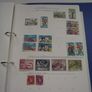 A collection of stamps from various countries on pages in binder (1872-2000s) Image 2