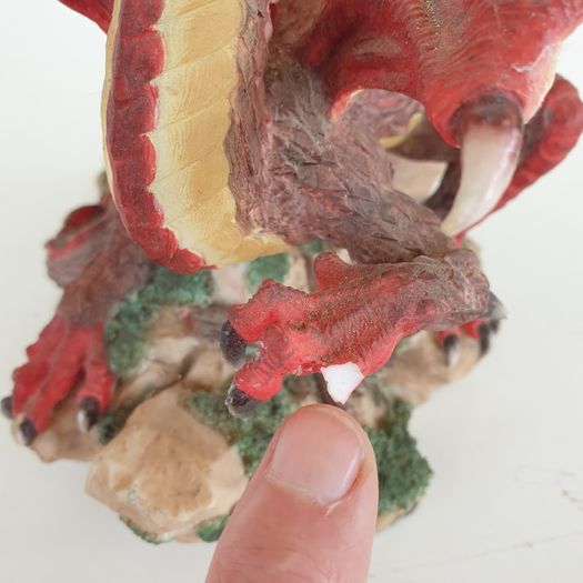 Red dragon figure on rock ceramic 19 cm high