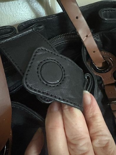 Genuine leather black and dark brown shoulder bag by Karen Millen
