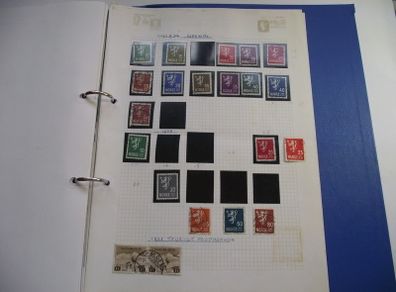 A collection of stamps from various countries on pages in binder (1872-2000s)