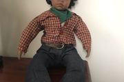 Lifelike doll in cute western clothes