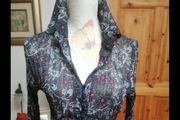 Beautiful silk lightweight material with buttons front long sleeves. Like new.