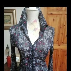 Beautiful silk lightweight material with buttons front long sleeves. Like new.