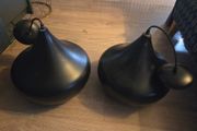 Black and gold pendant pair of lights