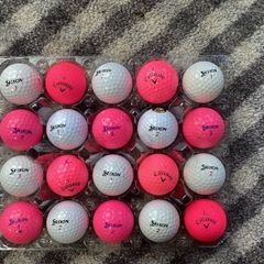 Pink and White golf balls
