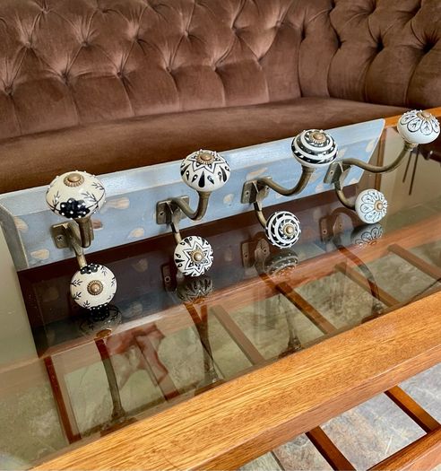 New Unused Stylish Entryway Mounted Ceramic and Brass Coat Hanger