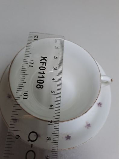 Purple flower teacup and saucer