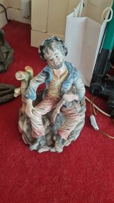 Vintage Italian Capodimonte Style Figurine. Hand Finished. Seated Man Holding Rifle. Made in Italy