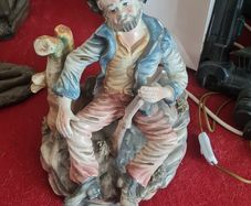 Vintage Italian Capodimonte Style Figurine. Hand Finished. Seated Man Holding Rifle. Made in Italy
