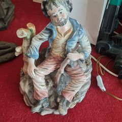 Vintage Italian Capodimonte Style Figurine. Hand Finished. Seated Man Holding Rifle. Made in Italy