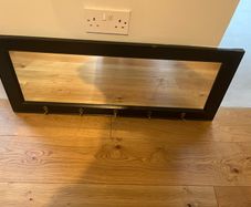 Coat rack with mirror