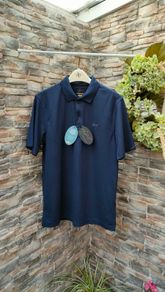 Greg Norman  Classic Pique Shark Polo Size Medium New With Tags