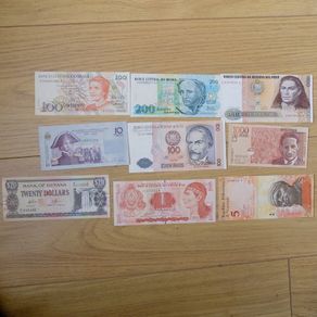 Lot of 9 World Banknotes.Uncirculated.N0.1.