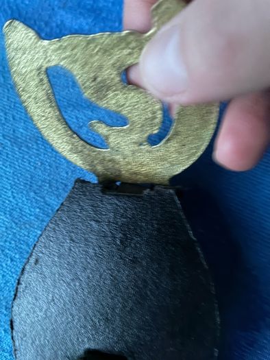 Vintage horse brasses on leather strap