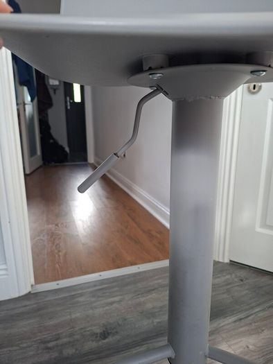 Two adjustable grey breakfast bar stools