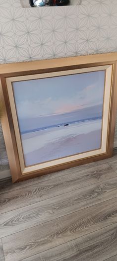 Two gold frame pictures with boats
