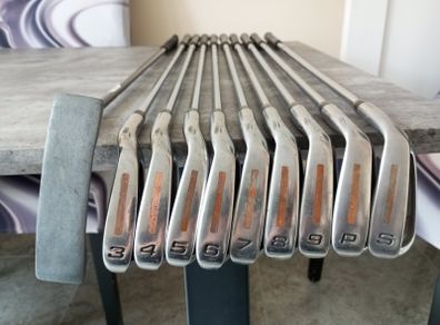 Colt golf irons and putter. Right handed clubs