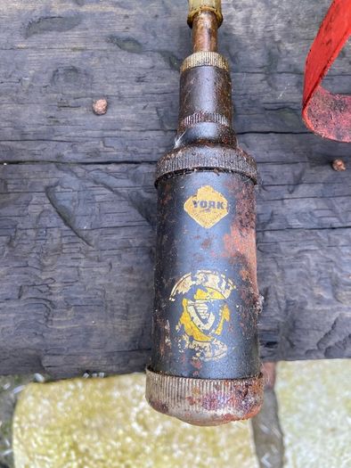 vintage Wesco oil cans and York grease pump