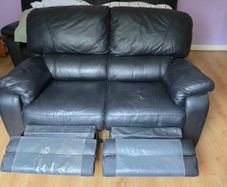 Two seater couch with recliners
