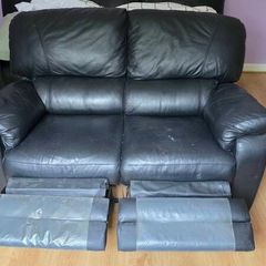 Two seater couch with recliners