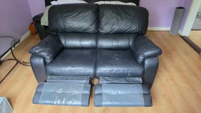 Two seater couch with recliners