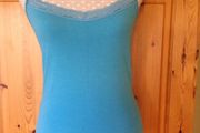 Size 10 Turquoise Strappy Cami Vest atop