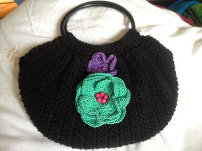 Handmade crochet bags hats and other items