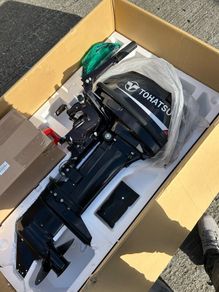 New in Box Tohatsu 18hp 2 Stroke Outboard.