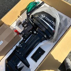 New in Box Tohatsu 18hp 2 Stroke Outboard.