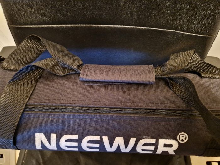 NEEWER, 2 Photography Tripods and feet and also 5ft circular Silver Light enhancer all in new condition and in lovely cases