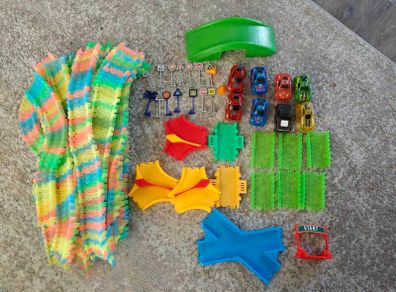Large Magic Tracks Glow Track Bundle... 50ft with 8 Working Cars and Accessories
