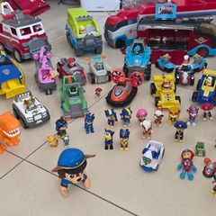 Large collection of Paw Patrol vehicles and figures