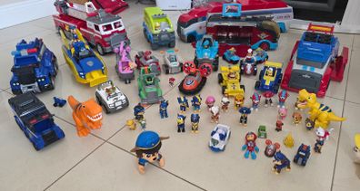 Large collection of Paw Patrol vehicles and figures