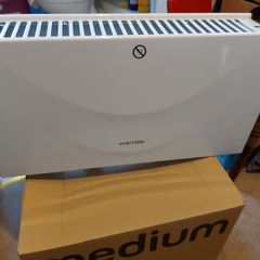 Warmlite Model WL41007 1800-2000W in as new condition with optional leg stands