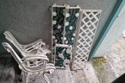 white cast iron garden benches