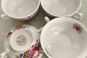 SET OF 4 SOUP BOWLS  the Staffordshire Potteries in Stoke-on-Trent, England. The text "Flowers Made by Royal Tudor Stoke-on-Trent England